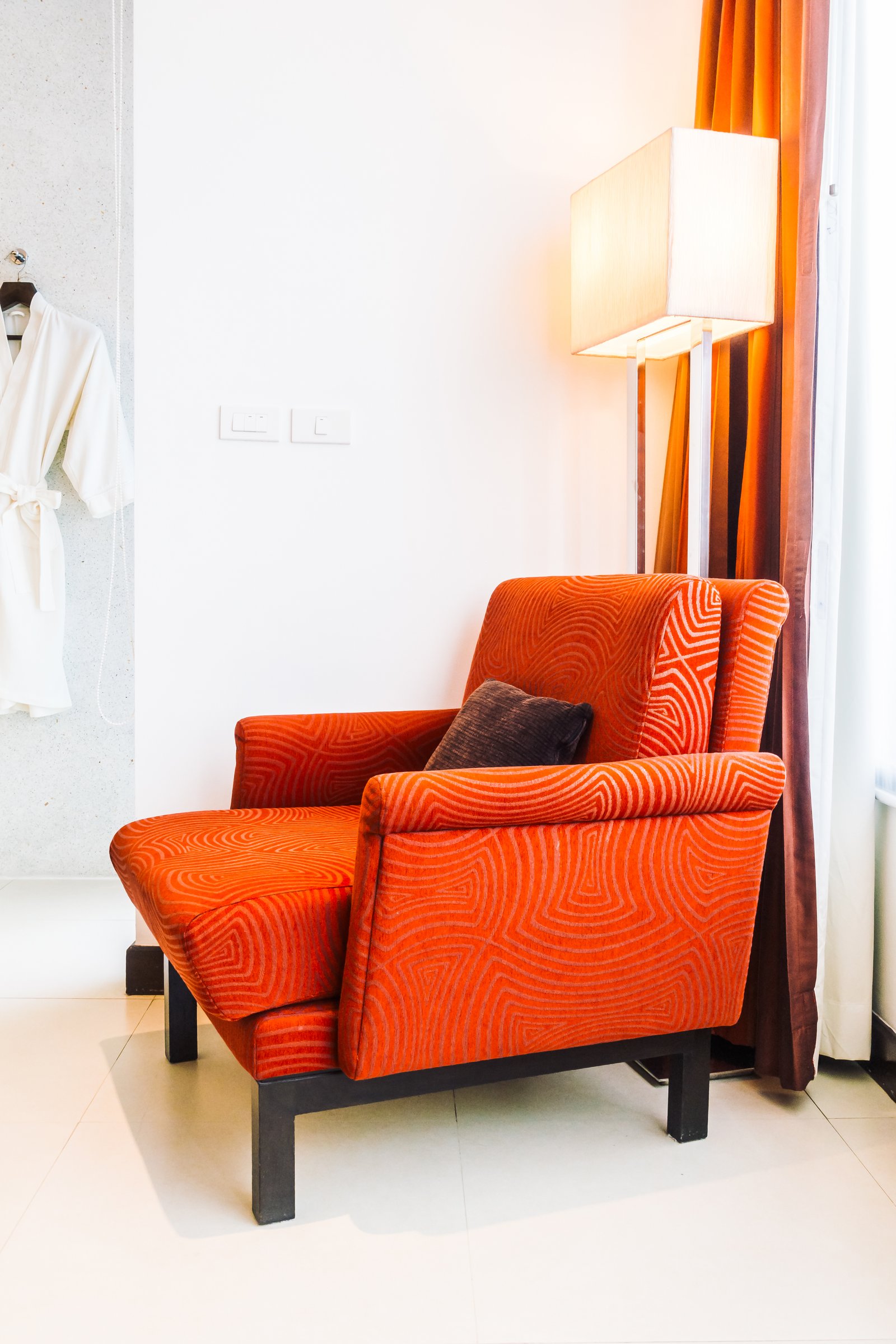 Layered soft furnishings in a calm interior